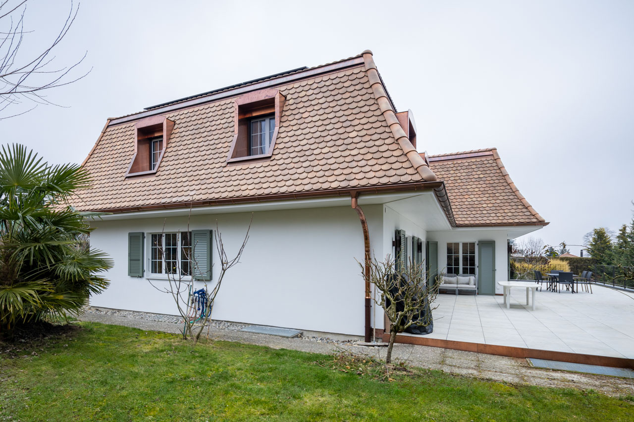 Transformation et surélévation d’une habitation.